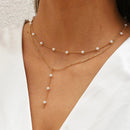 Collar Multicapa Gold Sparkling – Triple Cadena de Clavícula con Perlas