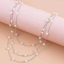 Collar Multicapa Gold Sparkling – Triple Cadena de Clavícula con Perlas